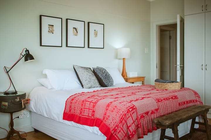 Our Main Bedroom has a King-size bed and generous cupboards