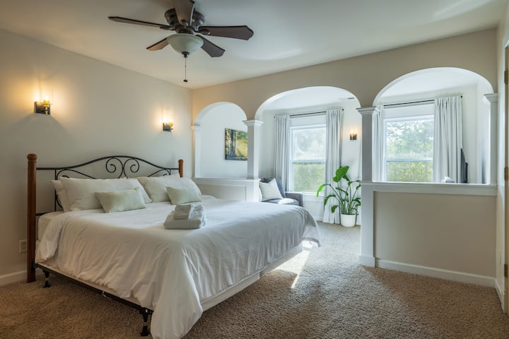 Light pours into this space all day long! Experience the calm, take in the views. Just be careful the whole day doesn't slip away in this cozy, spacious bedroom.