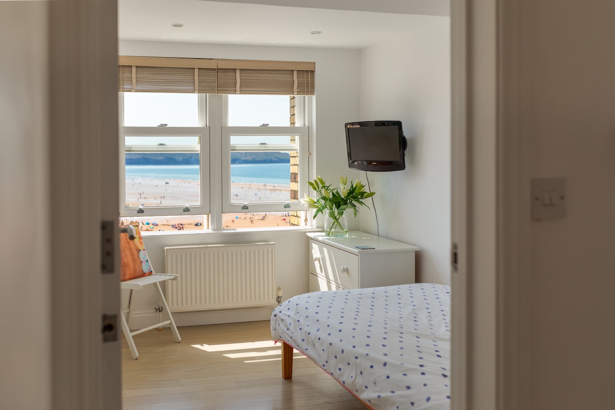 The third bedroom has a single bed but also extensive views across Woolacombe beach to Putsborough sands and Baggy point.