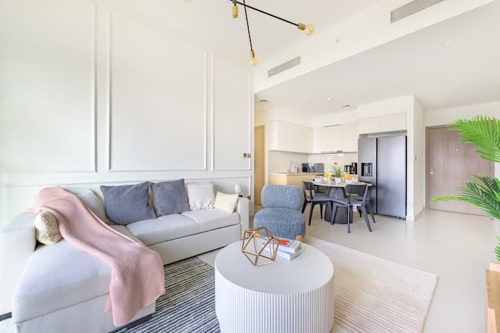 Chic and modern living room connected to the dining area. Comes with a sofa bed and a 75 inch smart television stream netflix, prime, youtube etc. Well lit up and spacious to seat up to 12 people. The sofa bed can easily sleep 2 adults.