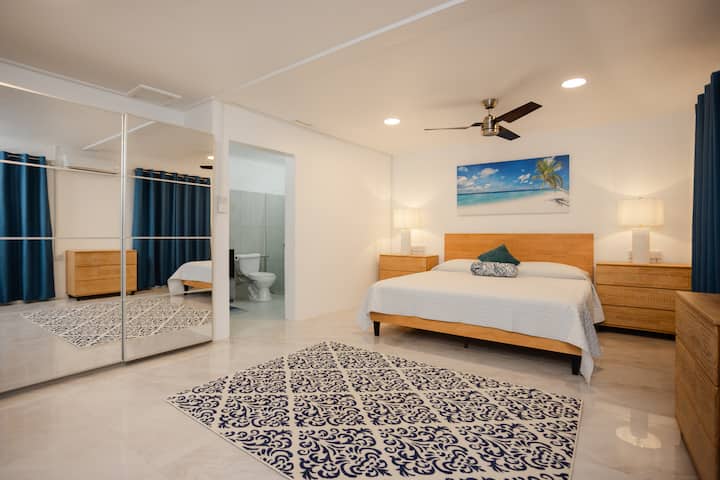 Spacious King Room featuring Closet for Storage. Includes additional Pillows and Luggage Stand.  