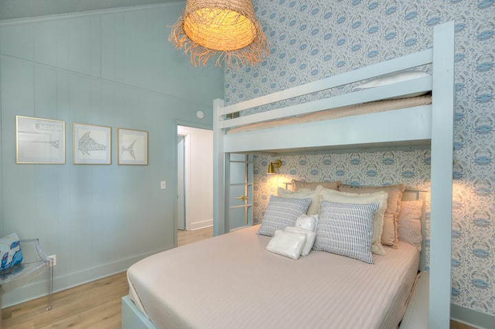 Main floor bunk room includes a twin over queen sleeping arrangement.