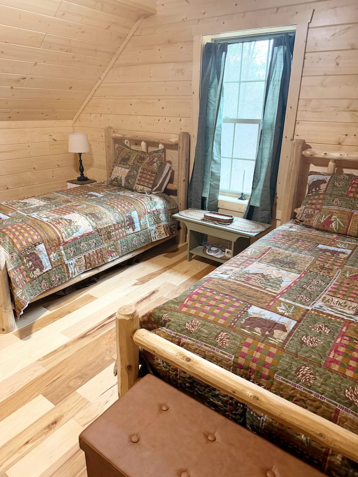 Plenty of space for two people in our twin bedroom space.  Each bed has its own phone charger and even a sleep machine but we don't think you'll need it due to the serene surroundings.  We can't help you though if your room mate snores :)