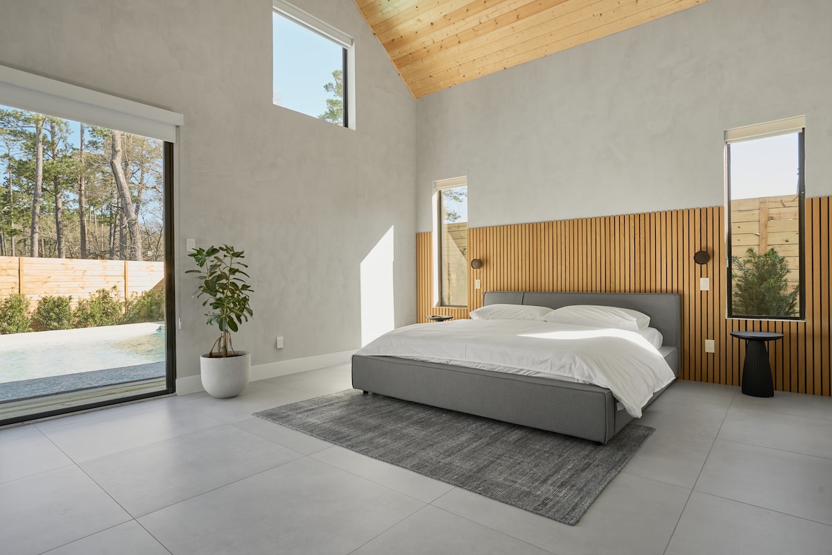 King-size bed with Casper bed linens.