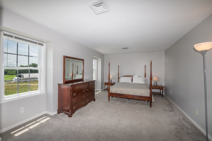 This bedroom features an en suite bathroom.  From this room, you have views of our pastures and may see cows and sheep grazing.