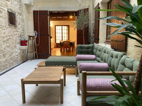 Large house centered/charming patio with glass roof