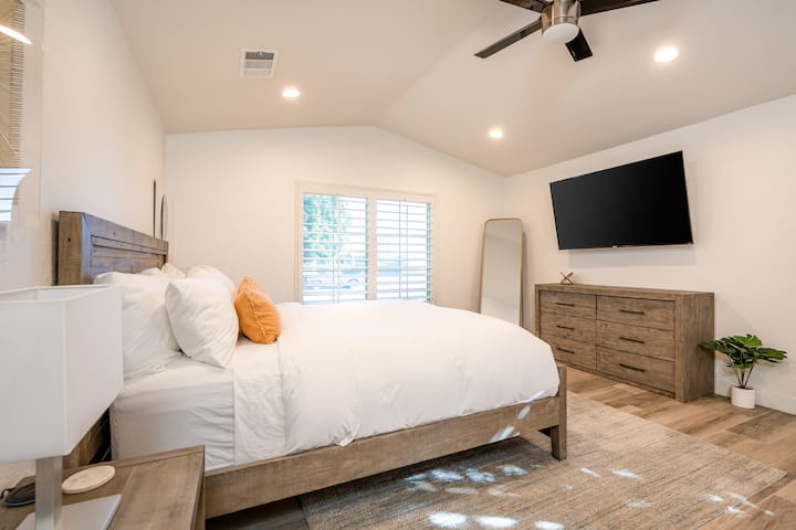 This beautiful primary bedroom in Indio, CA, is a tranquil retreat with king bed
