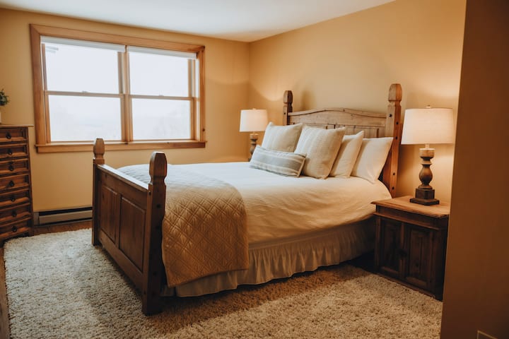 queen bedroom on the lower level