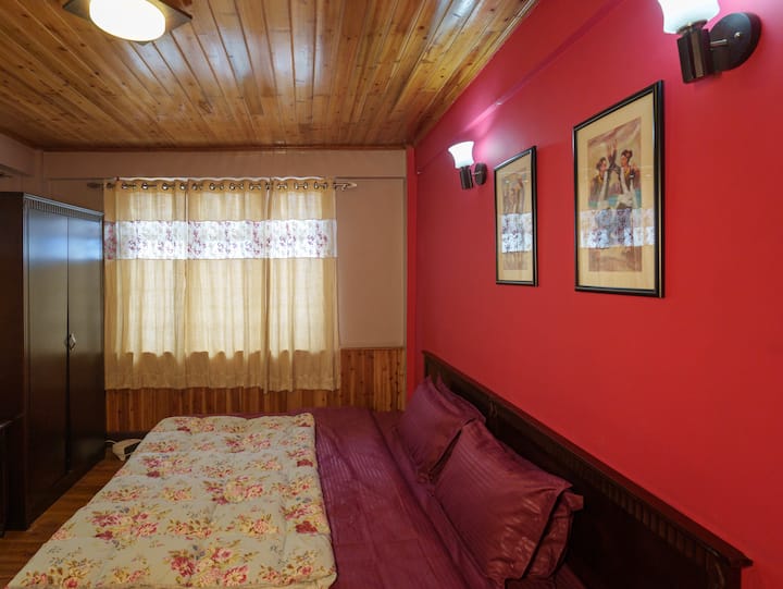 Enjoy a comfortable stay with a king-size bed, complemented by beautiful wooden flooring and all the essential amenities for a relaxing experience