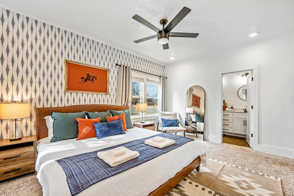 Experience comfort and convenience in our master bedroom, featuring a plush king bed and an en suite bathroom for your private retreat.