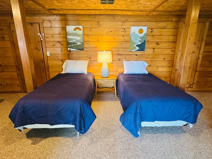 Lower level sleeping quarters over looking the lake with direct exterior access to the back yard.