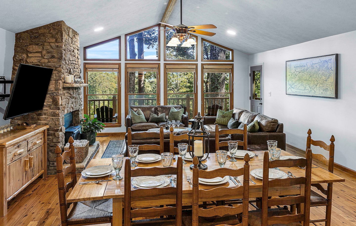 Gather the whole group onto the sofas under the vaulted beams, you will still find room at the table when everyone gets 