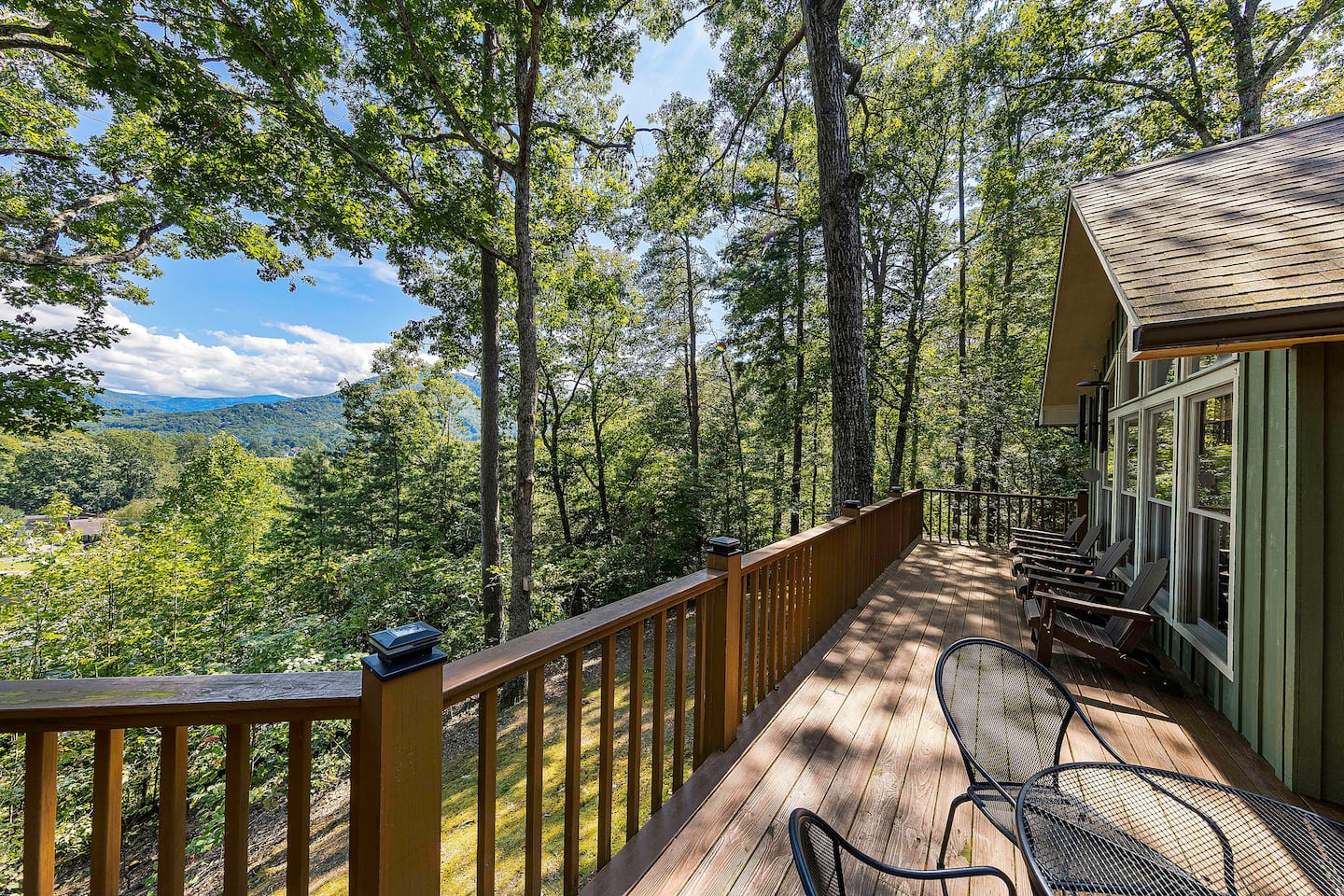 Stretch out along the back deck with the whole forest laid out in front of you, there's a chair waiting no matter which 