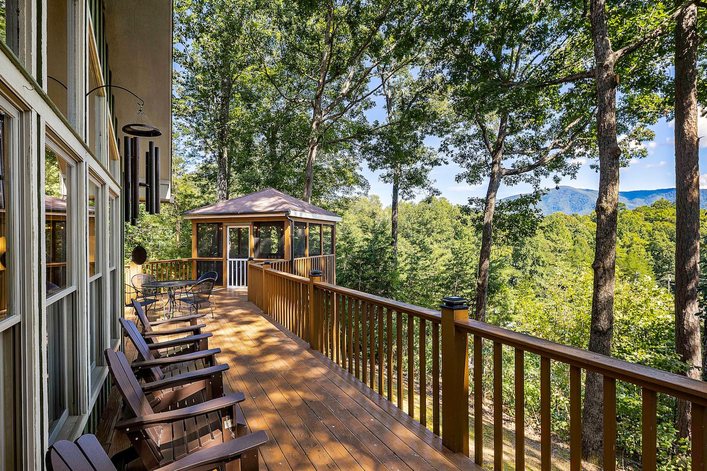 Smoky Mountain view at sunset from the deck at The Woodland Respite in Wears Valley