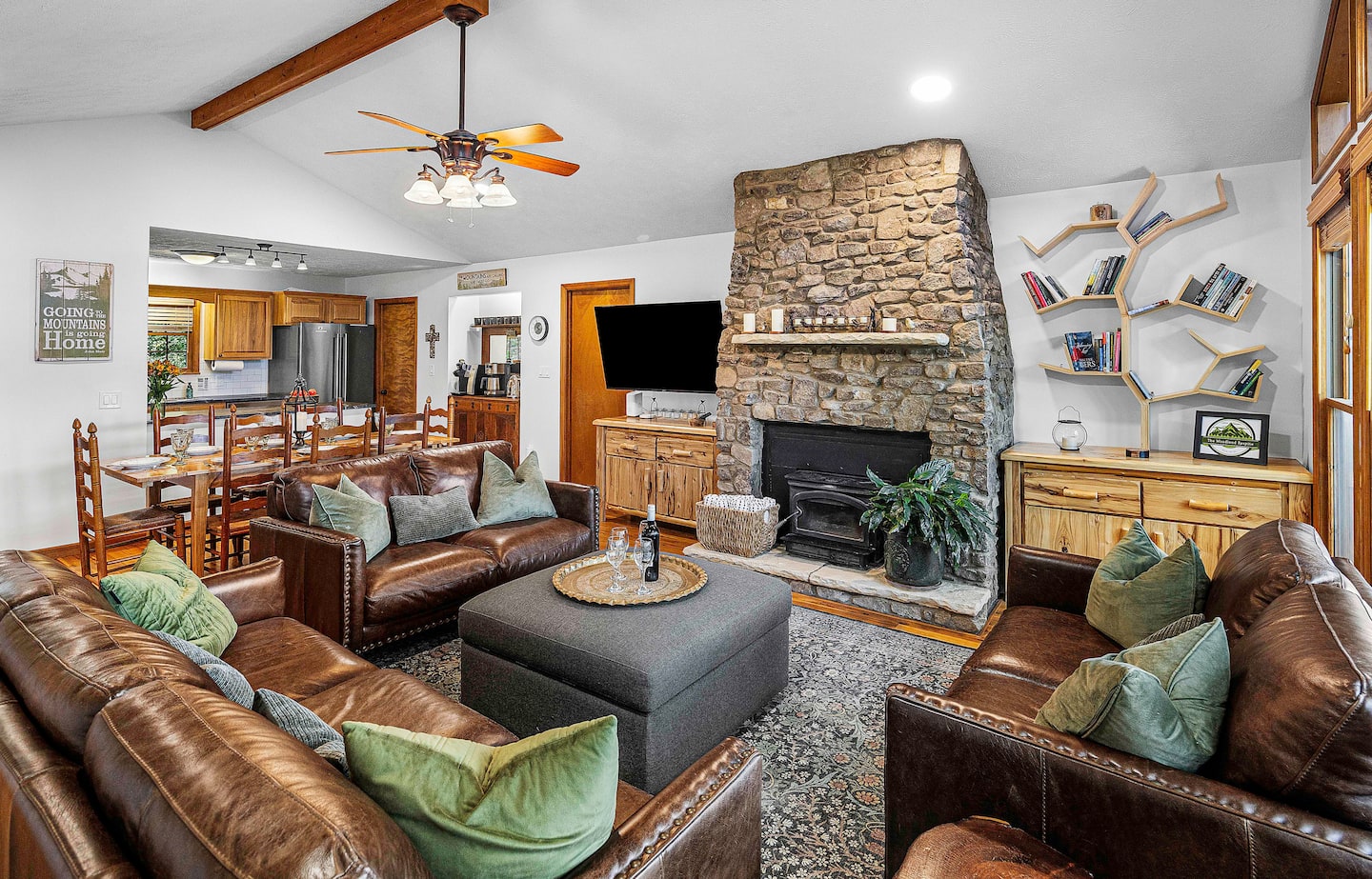 Spread out across the leather loveseats and couch while the kids run between the kitchen and great room - this room was 