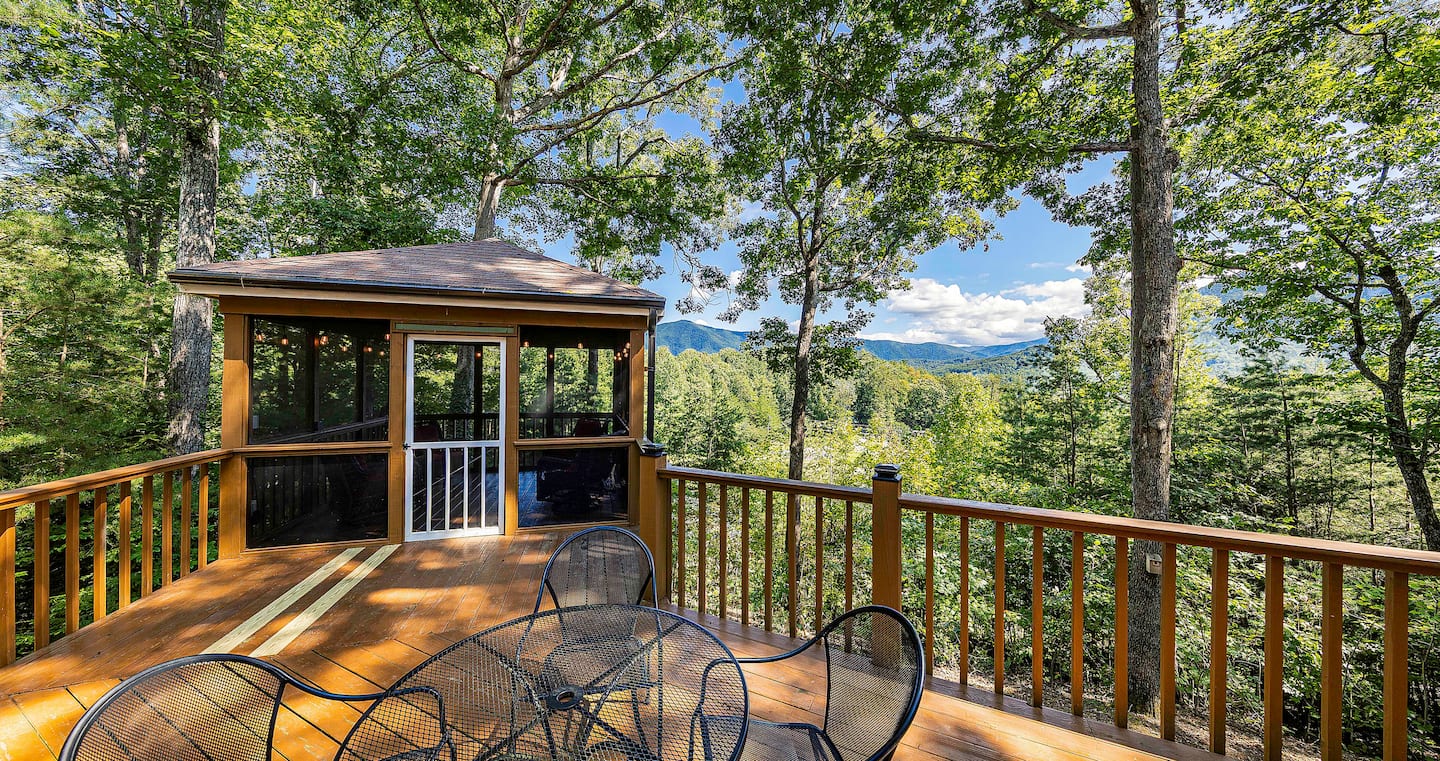 Stroll out of the main bedroom with coffee in hand and take in the ridge line layered out through the trees