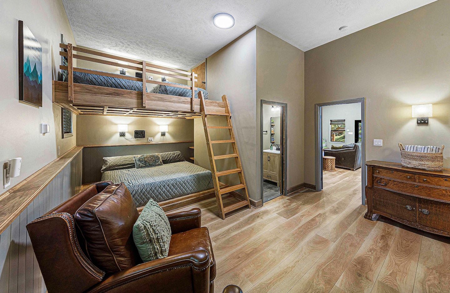 Our thoughtfully crafted bedroom in the guest house features a custom designed loft by a master carpenter