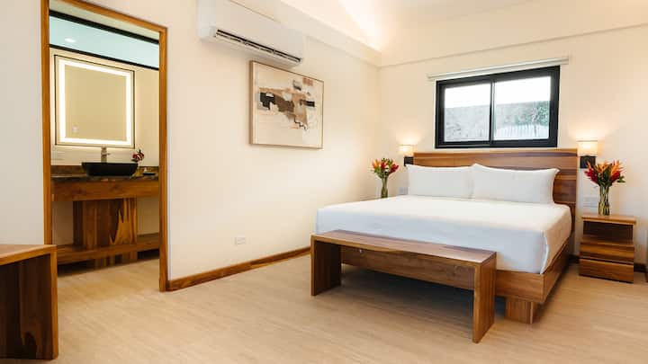Serene king bedroom with handcrafted wood bed