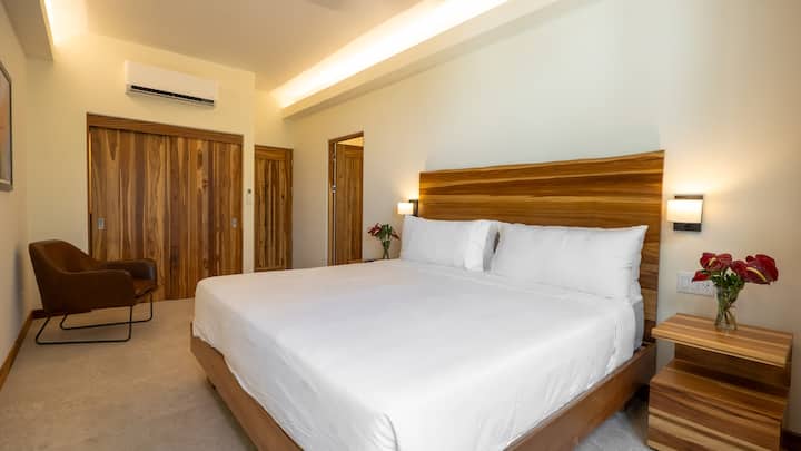 Air-conditioned king room with generous storage