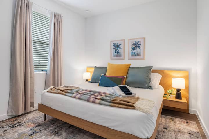 The luxurious king-sized bed awaits you, providing a relaxing sleep experience.