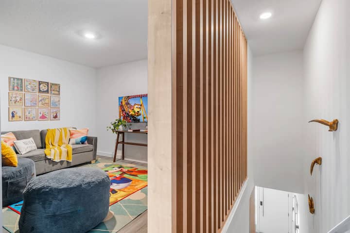As soon as you climb the stairs, you'll see the colorful family room.