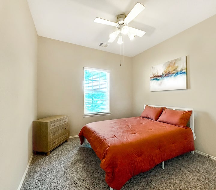 Bedroom Retreat: Bright space with modern decor and a serene view for restful nights!