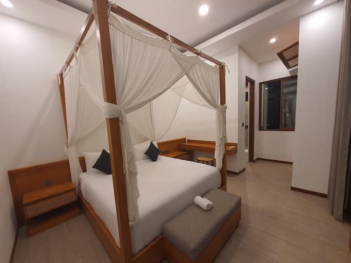 Step into tranquility at Casa Esquina Bali's ensuite bedroom—a serene retreat that blends tropical style with the soothing essence of Bali. Your personal escape awaits. #CasaEsquina
