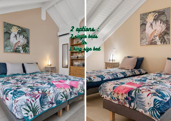 Modularna spavaća soba na katu: 2 kreveta za jednu osobu ili veliki bračni krevet
Privatna kupaonica
Radni stol