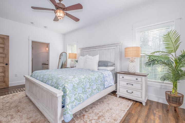 What coastal dreams are made of! The master is filled with relaxing beach vibes, lots of storage, a walk-in master closet, an en-suite bathroom, and wrap-around deck access.