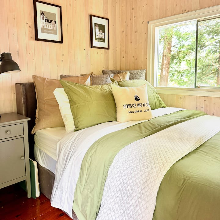 This bedroom is located in our bunkie (a term commonly used for a small, outbuilding primarily used as sleeping quarters). This is a seasonal room and is only open from May to October as it is not insulated. 