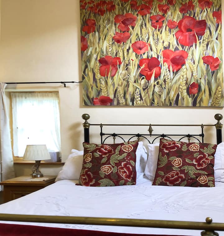 habitación de amapola con ducha en suite 