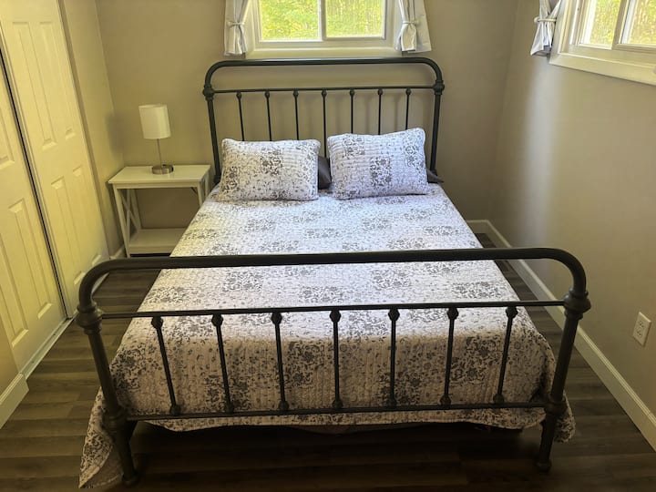 Queen bed and 32 inch smart TV