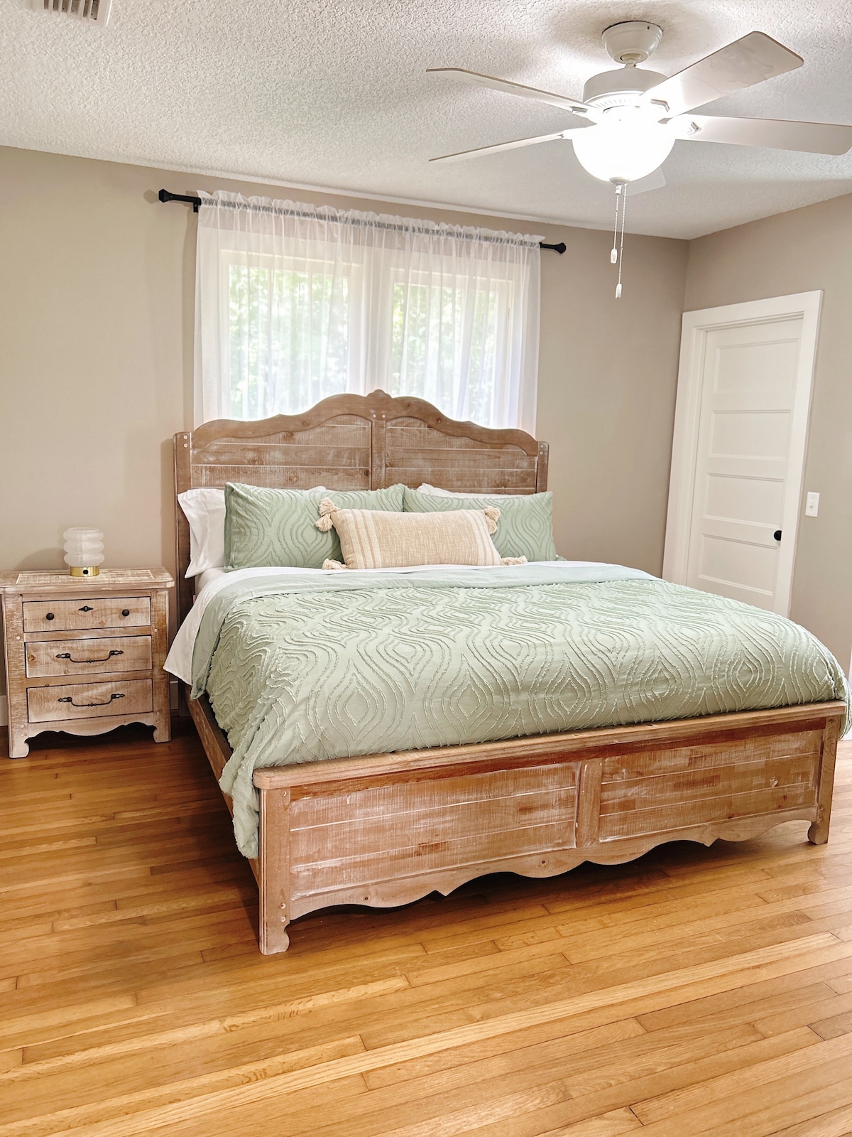 Our master bedroom has a king size bed and its own bathroom.