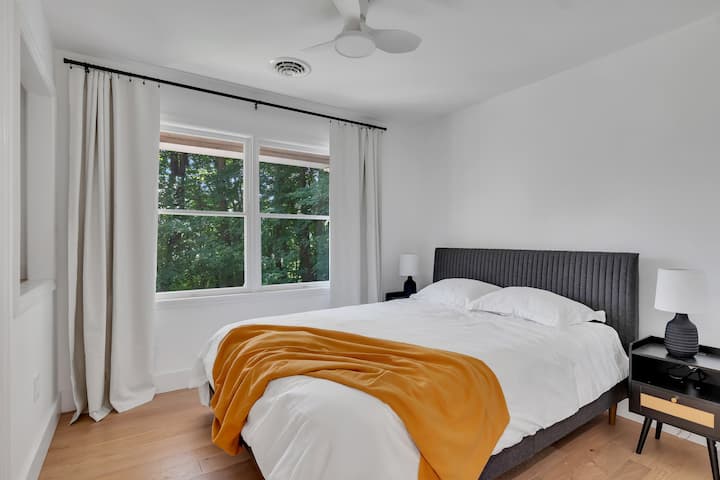 Bedroom 2 features a spacious king-size bed, offering plenty of comfort for a restful night’s sleep.