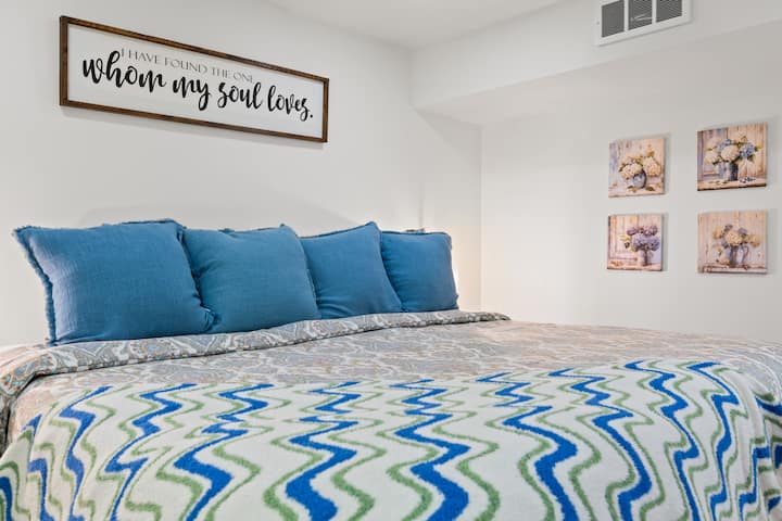 Comfortable King Bed with plenty of pillows and soft linens