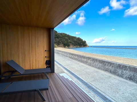 Beachfront rental villa with sauna. 30-second walk to the sandy beach!