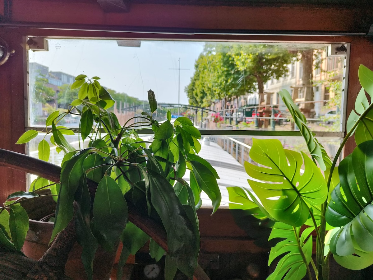 Living room image 2 at Lou Andrea Salome — historic cargo-ship wheelhouse in Ghent