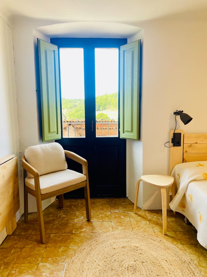 Chambre avec sortie balcon