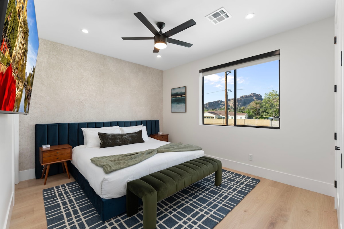 Large window offering mountain views and plenty of natural light.