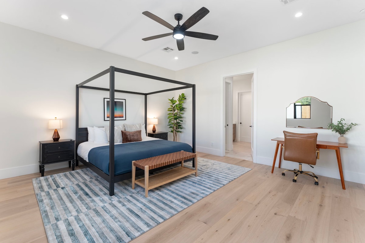 Spacious living room with large windows that fill the space with natural light.