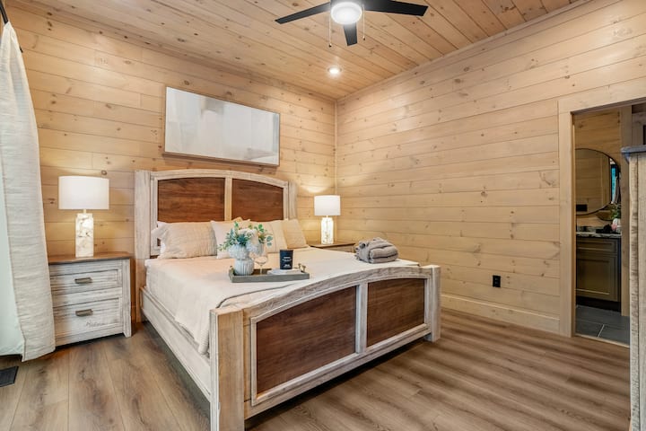 Drift into dreamland in a plush king bed made for ultimate comfort and relaxation.