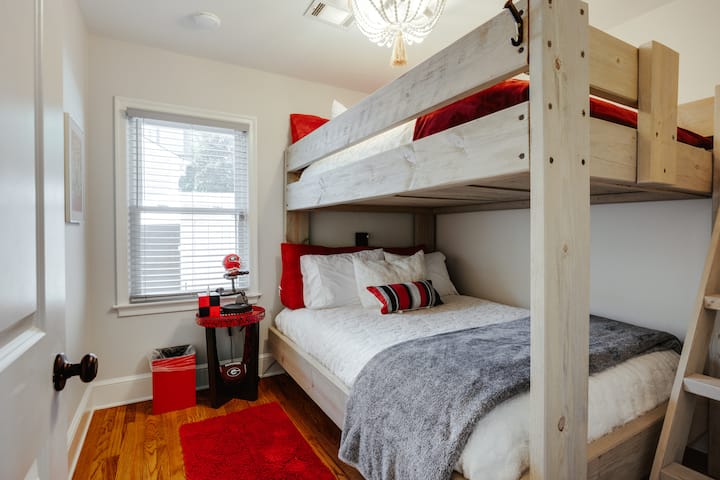 Another set of bunk beds with a double on the bottom and a twin on the top.