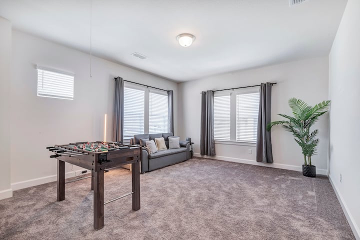 Our 2nd floor family room includes a full out sofa bed that can sleep two.  Foosball Table*
Get a theater level experience with our projector that includes YouTube and other screening apps.