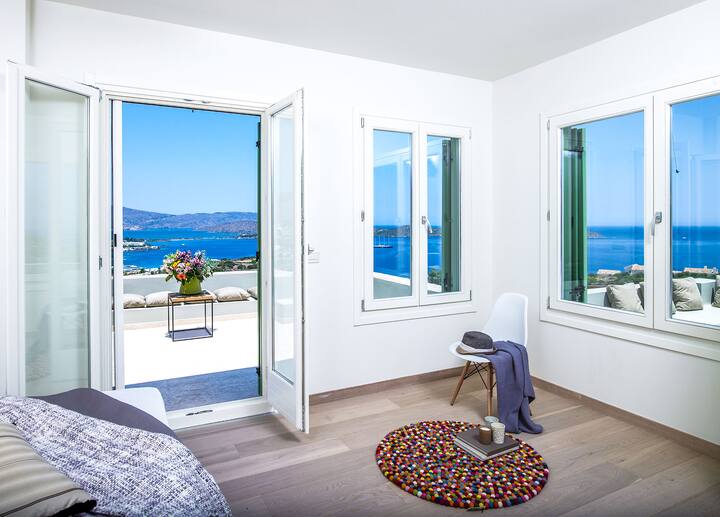 First Floor: Bedroom 2 with king bed, en-suite bathroom and private terrace