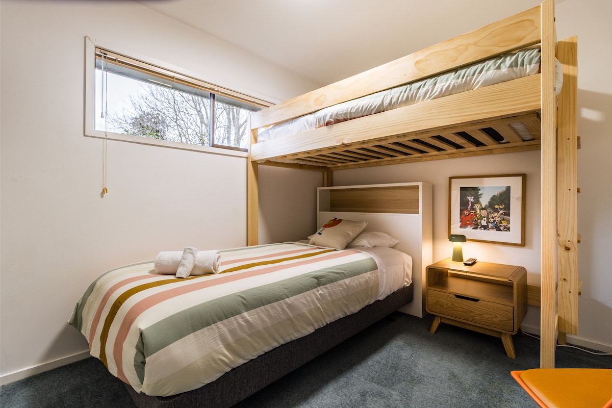 The ultimate kid zone—featuring a king single, plus a king single loft bed for sleepovers or siblings, a 43" TV, and vibes so cool the grown-ups might get jealous. It’s comfy, cosy, and perfectly set up for play, rest, and a bit of screen time too.