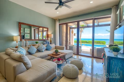 Beachfront Serenity! Modern condo with open Views!