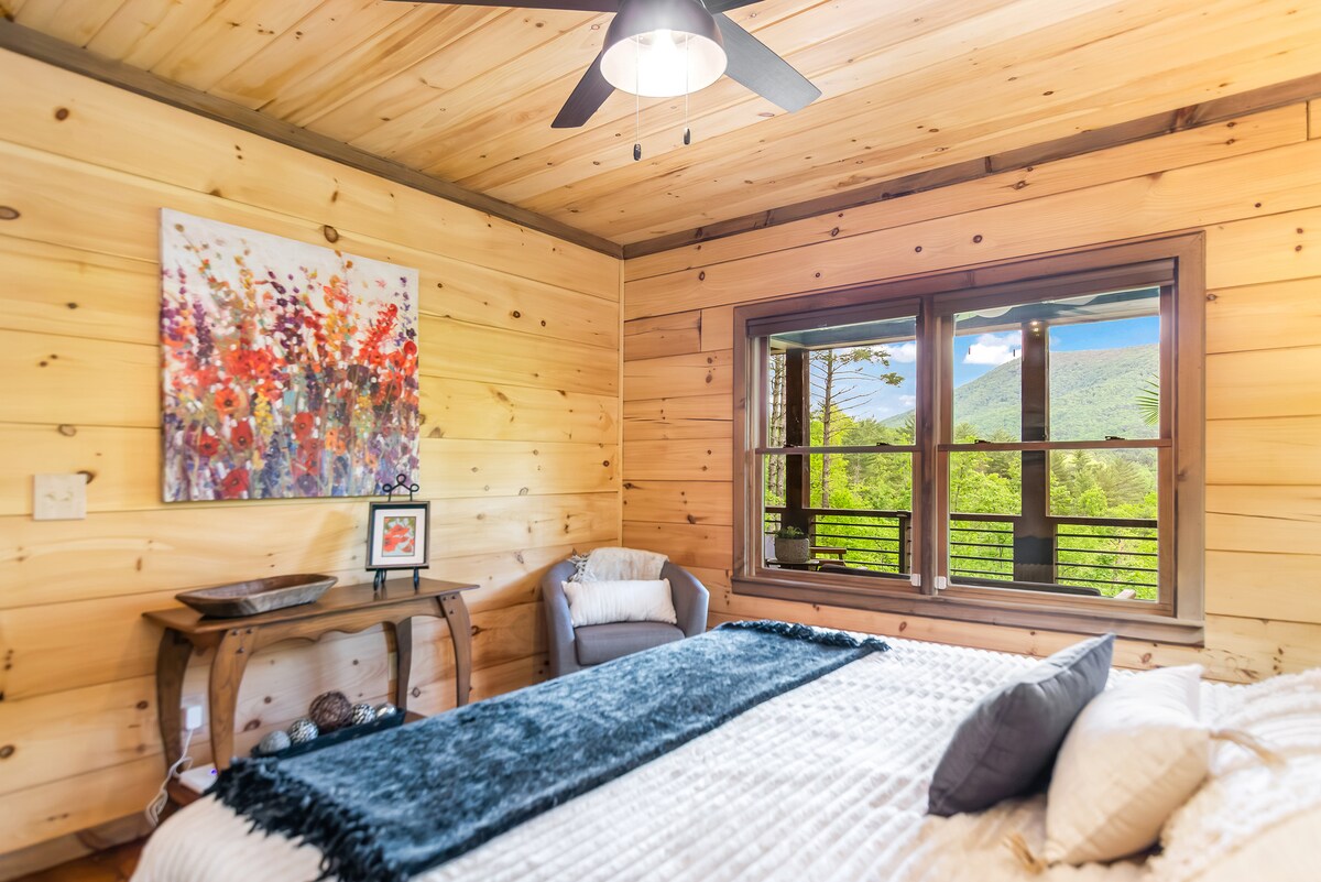Bedroom Retreat: Wake up to stunning mountain views and artistic charm in this inviting space!