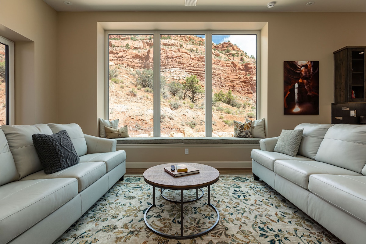 Relax on the couches or window seat, surrounded by stunning views.