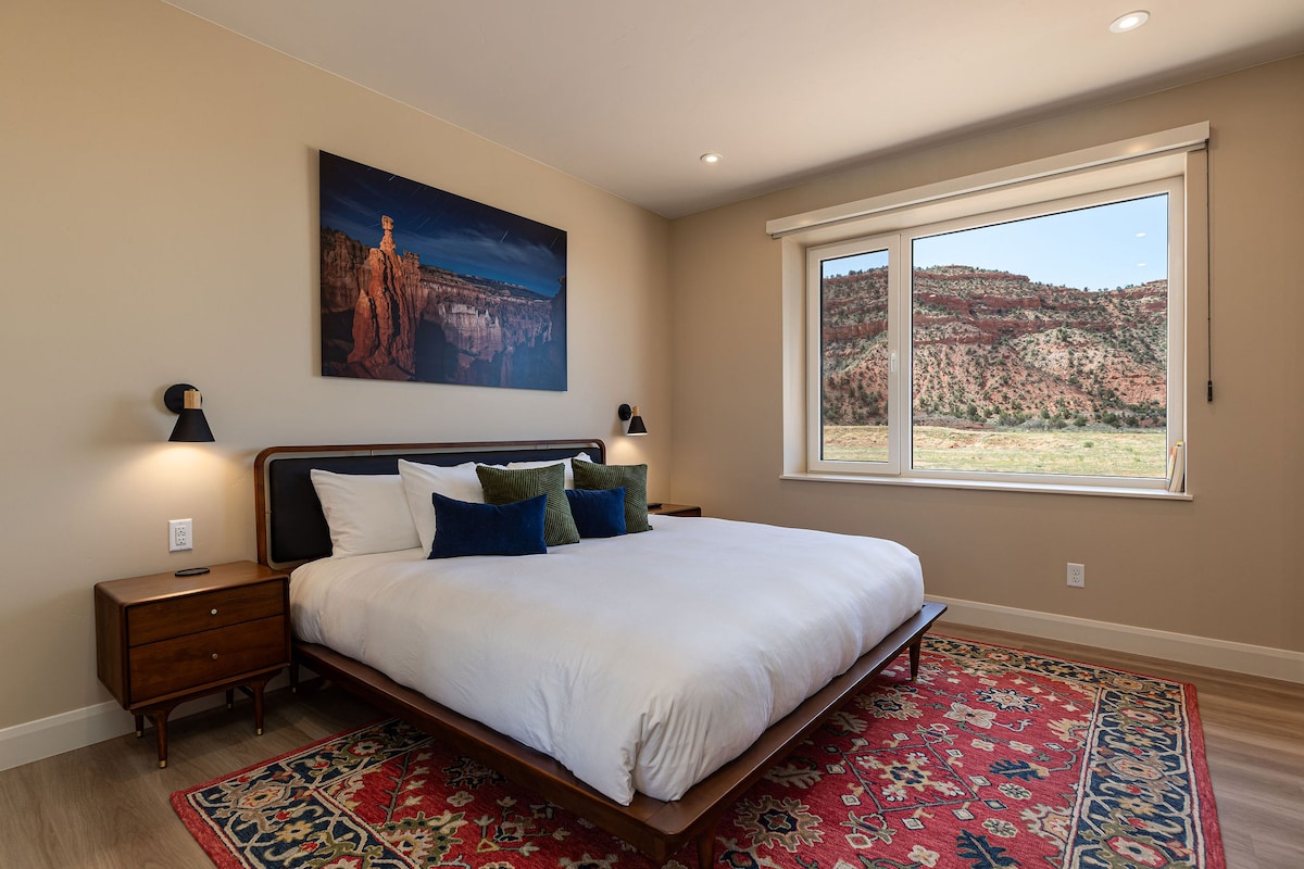 South facing views of the cliffs make for an inspirational stay in this king-sized bedroom.