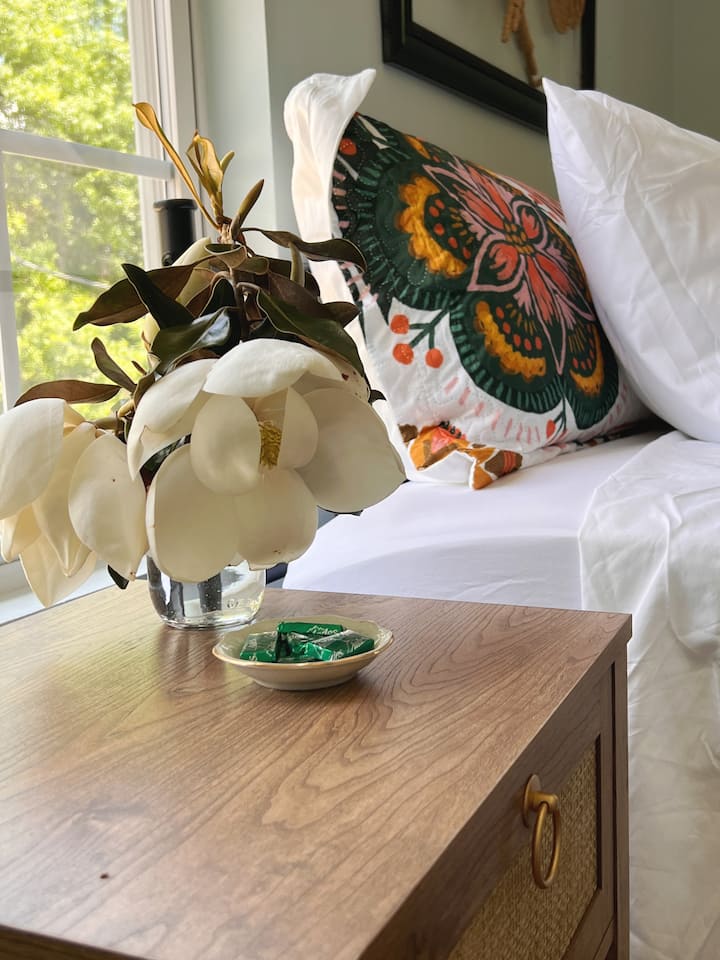 decorated in a Boho funk decor displaying items from a local artist -